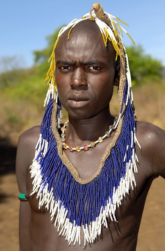Эфиопское племя Мурзи (5 фото)