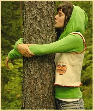 green activists in israel kissing trees photo