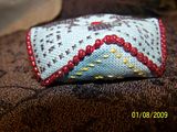 beads finished biscornu from side