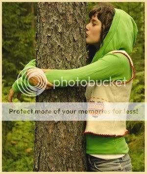 green activists in israel kissing trees photo